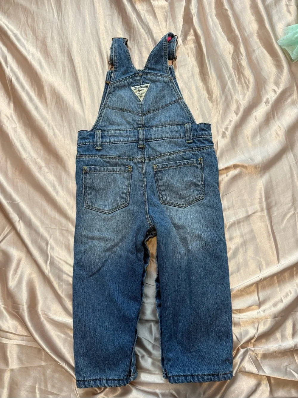 OshKosh B'gosh Fleece lined denim overalls.